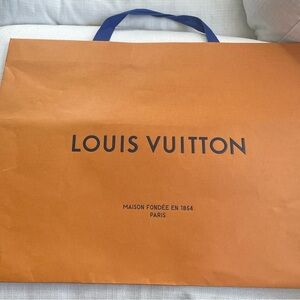 Louis Vuitton Bold Orange Bag with Blue Handles